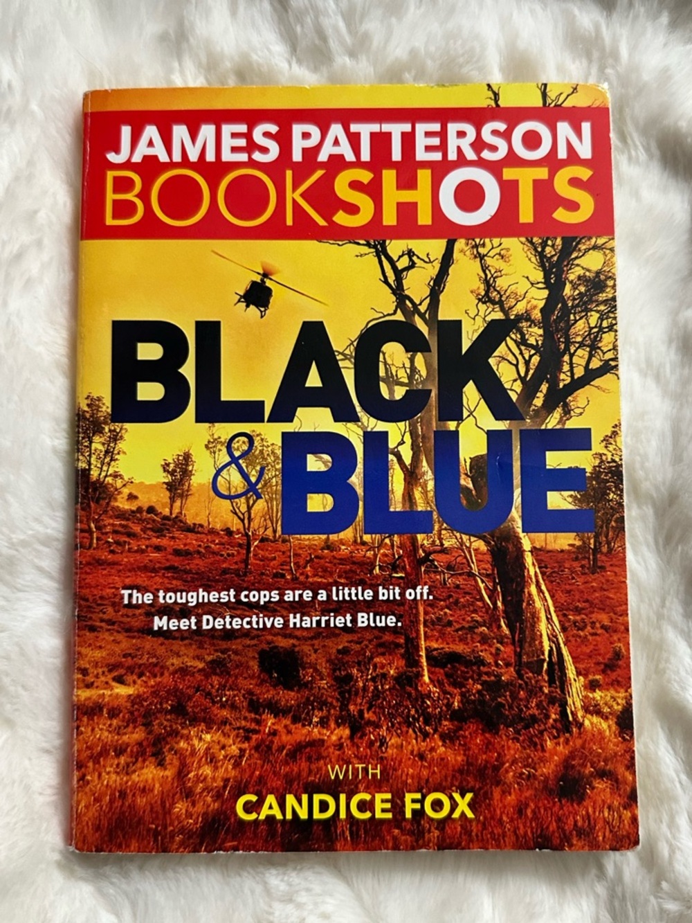 James Patterson BookShots "Black & Blue" Paperback - Yellow, Black, Blue